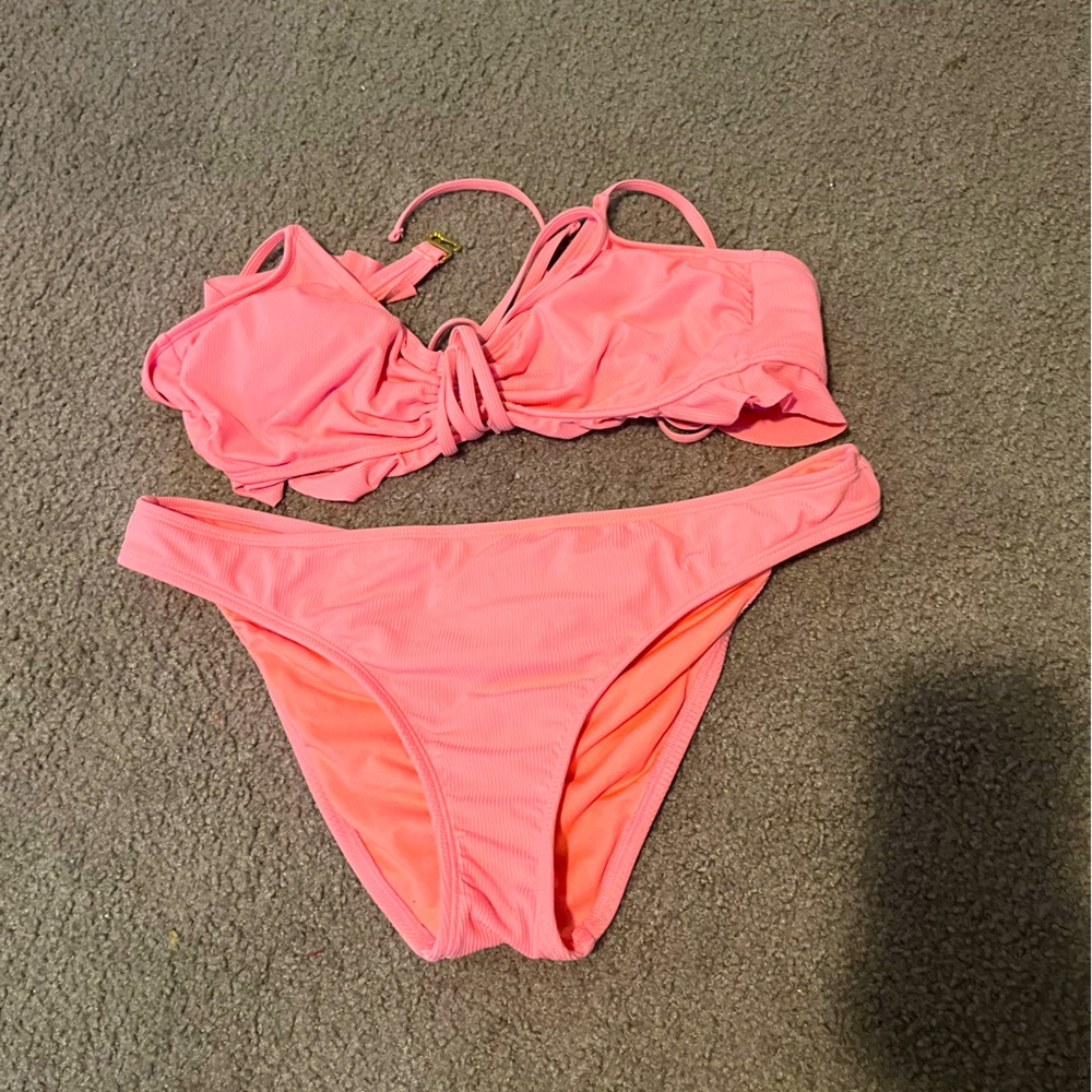This is a pink swimsuit only worn once